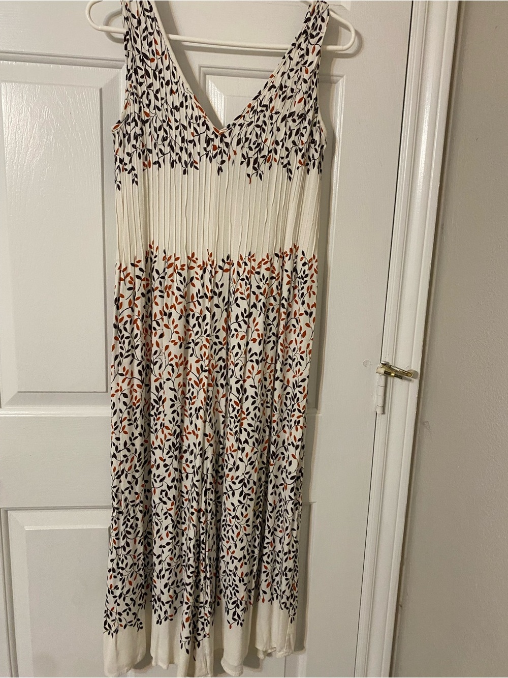 Sleeveless Cream Maxi Dress with Black and Rust Leaf Print